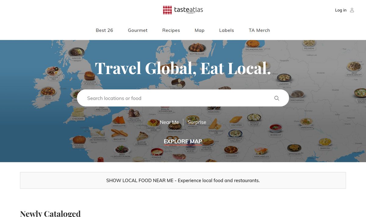 Site do TasteAtlas, o mapa da comida típica do mundo, com pratos espalhados pelo mapa e a busca por lugar ou comida